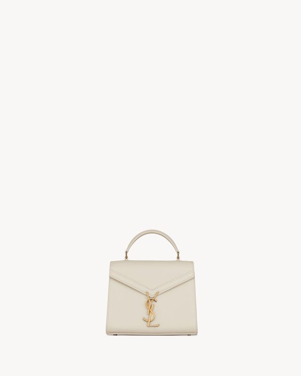 Cassandra Mini Top Handle Bag In Grain De Poudre Embossed Leather
